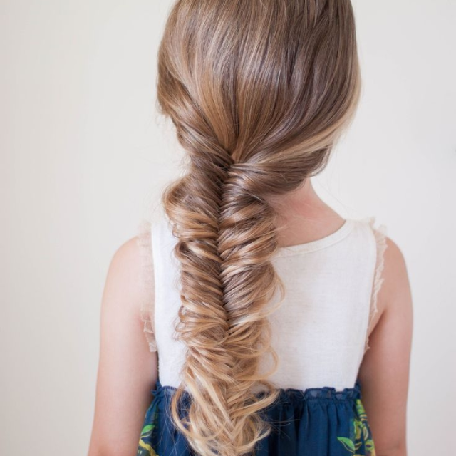 Intricately woven fishtail braid showcasing a unique and stylish hairdo