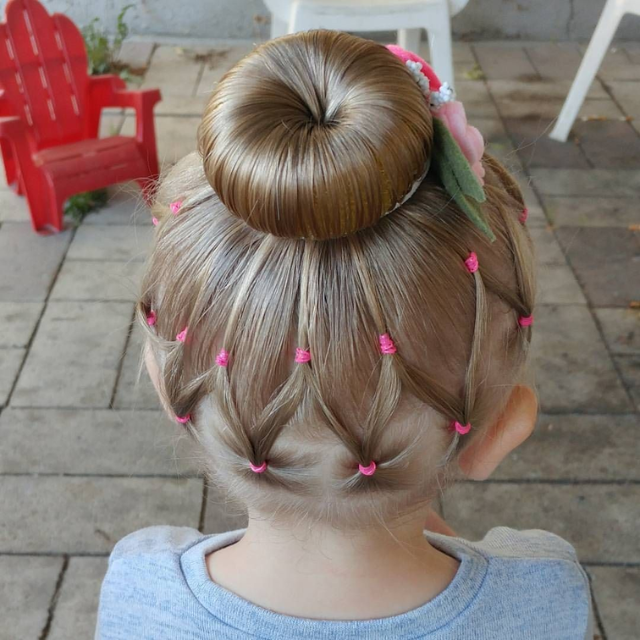  Delightful butterfly bun hairstyle with loops and wings, creating a whimsical look