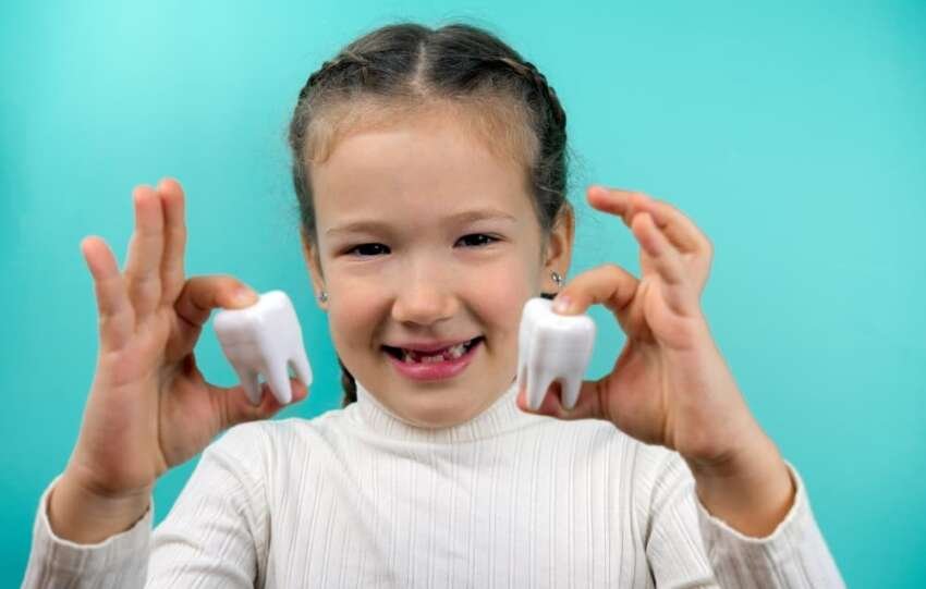 Why Do Kids Get Silver Teeth